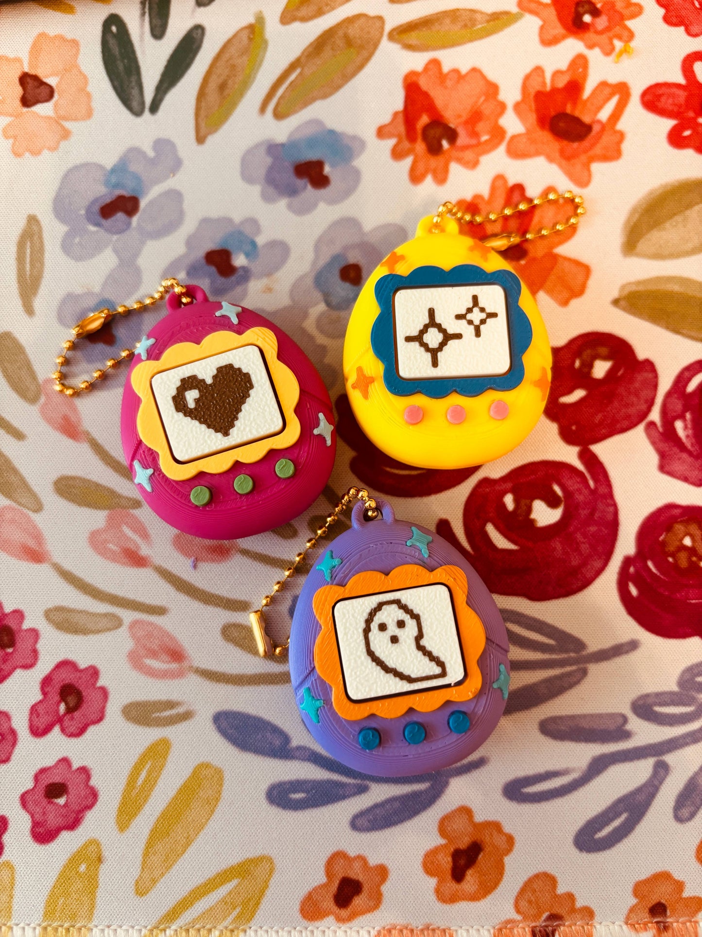 Stella Cake Creations - Y2K inspired Fidget Pet Keychain: Purple base / Ghost screen